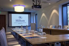 Meeting room with u shape table at the Hilton London Heathrow Airport Terminal 5.