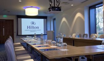 Meeting room with u shape table at the Hilton London Heathrow Airport Terminal 5.