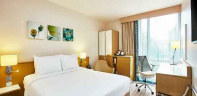 King bedroom with desk and window at the Hilton Garden Inn Birmingham Brindleyplace.