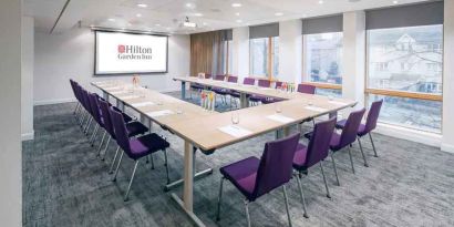 Meeting room with u shape table at the Hilton Garden Inn Birmingham Brindleyplace.