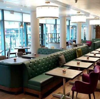 Dining area perfect for co-working at the Hilton Garden Inn Birmingham Brindleyplace.