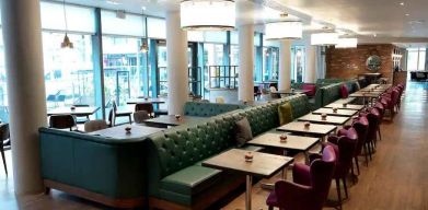 Dining area perfect for co-working at the Hilton Garden Inn Birmingham Brindleyplace.