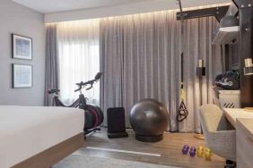 Hotel room with fitness corner at the DoubleTree by Hilton London Angel Kings Cross.