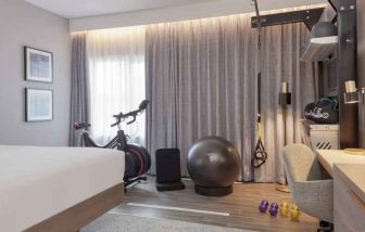 Hotel room with fitness corner at the DoubleTree by Hilton London Angel Kings Cross.