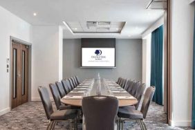 Small meeting room with TV screen at the DoubleTree by Hilton London Angel Kings Cross.