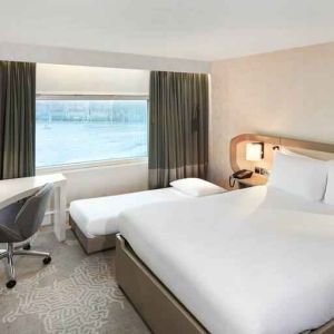 Queen room with pullout single bed at the Hilton London Heathrow Airport.