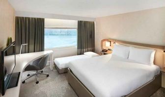 Queen room with pullout single bed at the Hilton London Heathrow Airport.