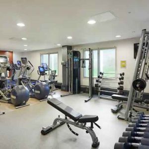 Fully equipped fitness center at the Hilton London Heathrow Airport.