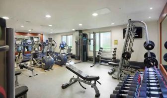 Fully equipped fitness center at the Hilton London Heathrow Airport.