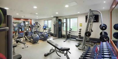 Fully equipped fitness center at the Hilton London Heathrow Airport.