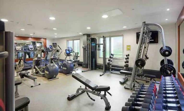 Fully equipped fitness center at the Hilton London Heathrow Airport.