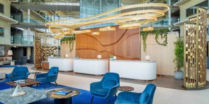 Stylish lobby workspace at the Hilton London Heathrow Airport.