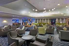 Elegant dining area with tables and chairs at the DoubleTree by Hilton Bristol North.