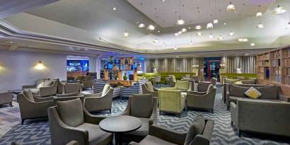 Elegant dining area with tables and chairs at the DoubleTree by Hilton Bristol North.