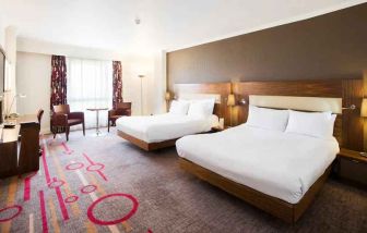 Double room with desk and window at the DoubleTree by Hilton Dartford Bridge.