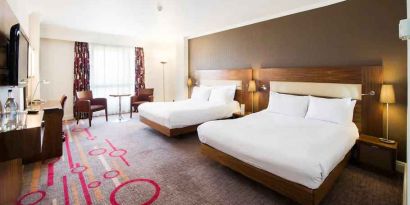 Double room with desk and window at the DoubleTree by Hilton Dartford Bridge.