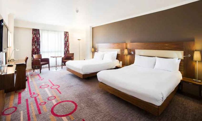 Double room with desk and window at the DoubleTree by Hilton Dartford Bridge.