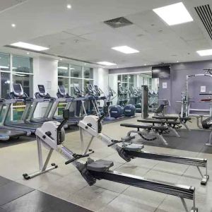 Fully equipped fitness center at the DoubleTree by Hilton Dartford Bridge.