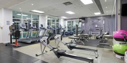 Fully equipped fitness center at the DoubleTree by Hilton Dartford Bridge.