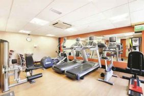 Fitness center with machines at the DoubleTree by Hilton Manchester Airport.