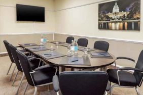 Small meeting room with TV screen at the DoubleTree by Hilton Manchester Airport.