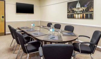 Small meeting room with TV screen at the DoubleTree by Hilton Manchester Airport.