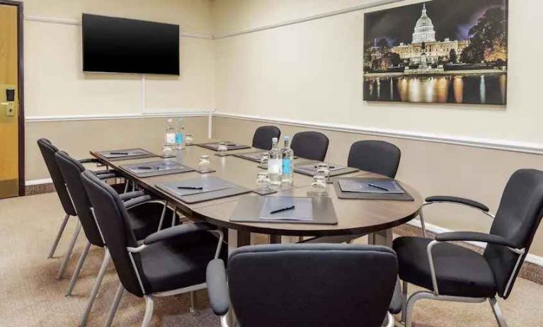 Small meeting room with TV screen at the DoubleTree by Hilton Manchester Airport.