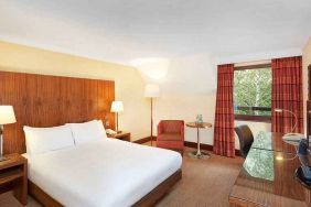 Bright king bedroom with desk at the DoubleTree by Hilton Southampton.