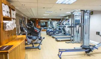 Fitness center with machines at the Hilton London Kensington.