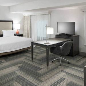 Beautiful studio space with 1 king bed, desk, tv and premium features at the Hampton Suites Atlanta Perimeter Dunwoody