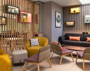 Comfortable lobby workspace at the Hampton by Hilton London Ealing.