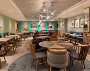 Dining area perfect for co-working at the Hampton by Hilton London Ealing.