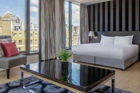 spacious king suite with city views at DoubleTree by Hilton London Greenwich.