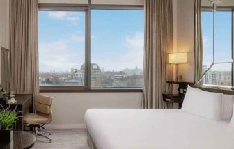 comfortable king room with work desk and lots of natural light at DoubleTree by Hilton London Greenwich.