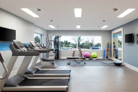 Fitness center with treadmills at the Hampton by Hilton Bristol Airport.