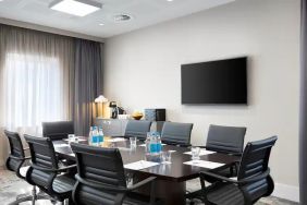 Small meeting room with TV screen at the Hampton by Hilton Bristol Airport.