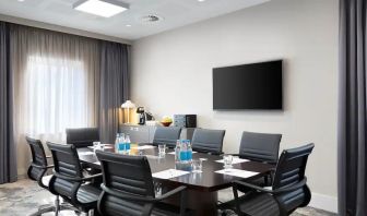 Small meeting room with TV screen at the Hampton by Hilton Bristol Airport.