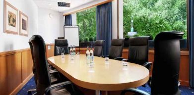 Beautiful meeting room with comfortable chairs at the Hilton Birmingham Metropole.