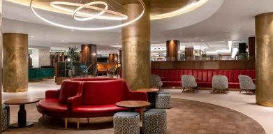 Lobby workspace with chairs and sofas at the Hilton Birmingham Metropole.