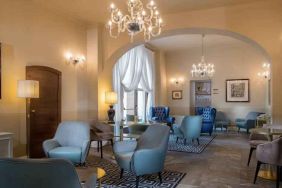 Stylish lobby workspace at the Grand Hotel Villa Torretta Milan Sesto, Curio Collection.