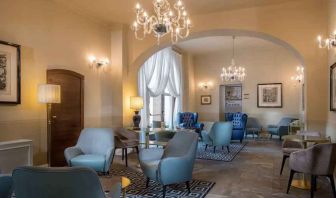 Stylish lobby workspace at the Grand Hotel Villa Torretta Milan Sesto, Curio Collection.