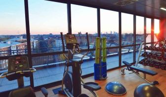 Fitness center with view at the Hilton Garden Inn Milan North.