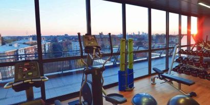 Fitness center with view at the Hilton Garden Inn Milan North.