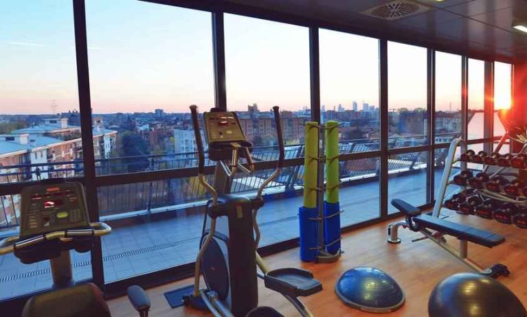 Fitness center with view at the Hilton Garden Inn Milan North.