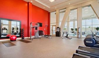 well equipped fitness center with natural light at Homewood Suites by Hilton University City Philadelphia, PA.