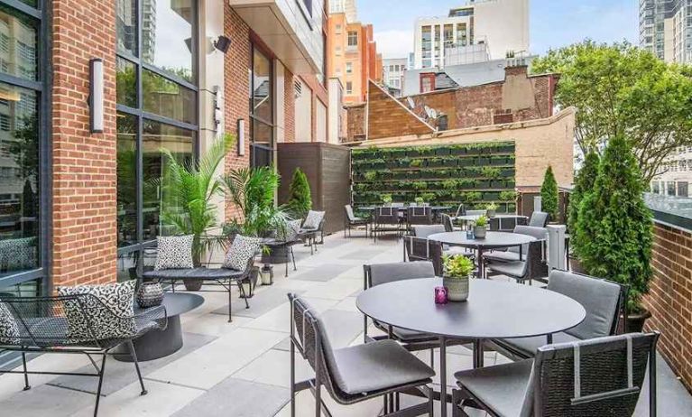 lovely outdoor patio with city scape views at Canopy by Hilton Jersey City Arts District.