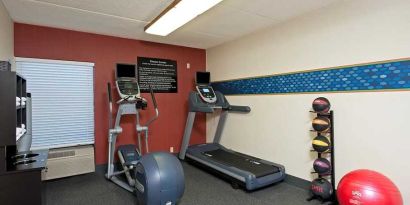 well equipped fitness center at Hampton Inn Bloomington.