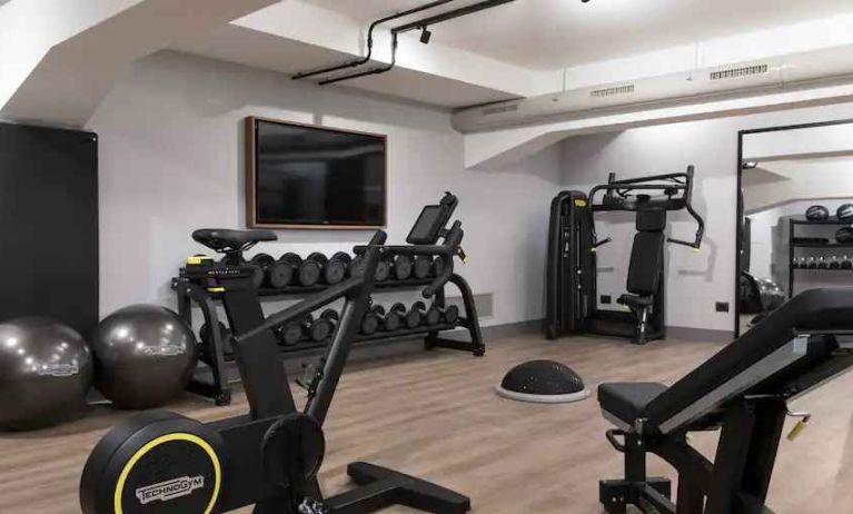 Fully equipped fitness center at the DoubleTree by Hilton Rome Monti.