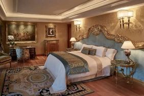 Elegant and comfortable king suite at the Rome Cavalieri, A Waldorf Astoria Hotel.