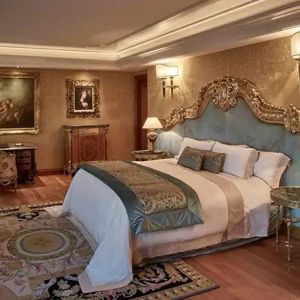 Elegant and comfortable king suite at the Rome Cavalieri, A Waldorf Astoria Hotel.